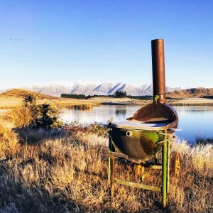 The 'Windwhistle Fryer' overlooking the High Peak lake in New Zealand